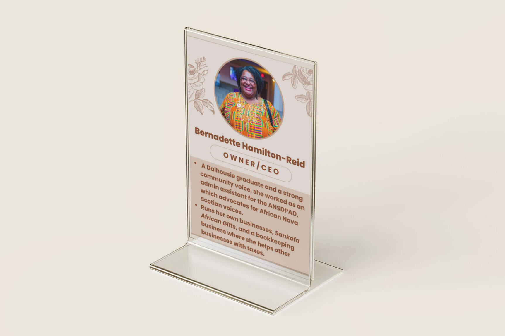 A small plastic display of a profile card for the University of King's College.